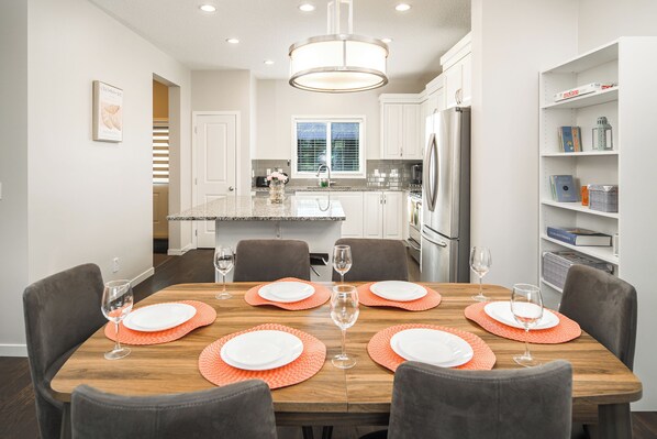 Dining - Entire modern and comfortable family home with AC in SE! (Calgary)