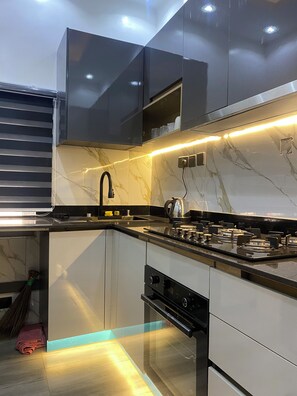 Private kitchen - Contemporary decorated 2-bedroom apartment in a serene environment in Surulere. (Lagos)