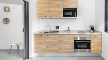 Appartement, vue partielle sur la mer | Terrasse/Patio