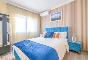 2 chambres, coffre-fort, fer et planche à repasser, lit de bébé portatif