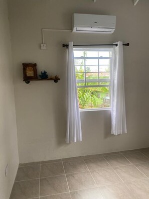 Căn hộ tiện nghi đơn giản, quang cảnh vườn | 1 phòng ngủ, két bảo mật tại phòng, bàn ủi/dụng cụ ủi quần áo