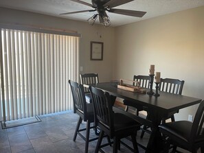 Dining - Spacious and cozy 4-bedroom house in rural Iowa with inground backyard pool. (Logan)