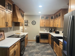 Fridge, microwave, oven, stovetop - Spacious and cozy 4-bedroom house in rural Iowa with inground backyard pool. (Logan)