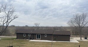 Exterior - Spacious and cozy 4-bedroom house in rural Iowa with inground backyard pool. (Logan)
