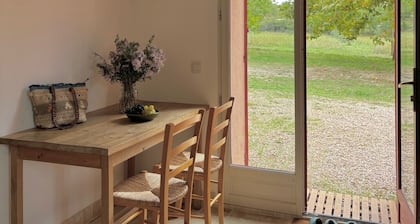Provençal farm among olive trees; view of the hill from a large shaded terrace