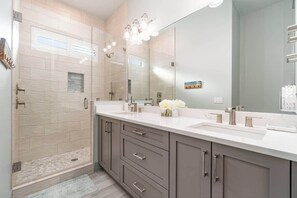 Shower, hair dryer, towels