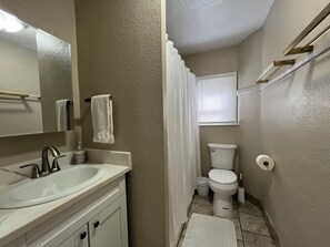 Hair dryer, towels, soap, shampoo