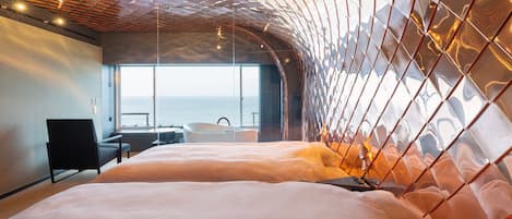 Chambre Design avec lits jumeaux, 2 chambres, non-fumeur, vue mer | Vue sur la plage/l’océan