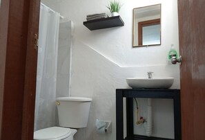 Basic Studio, Mixed Dorm, Private Bathroom, City View | Bathroom | Shower, rainfall showerhead, towels, soap