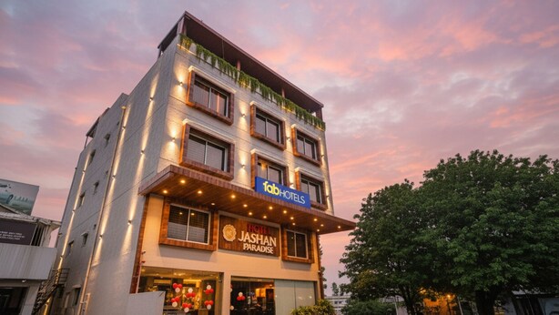 A multi-story hotel with a modern facade, featuring a prominent sign for 'Jashan Paradise' and 'Fab Hotels'. - FabHotel Prime Jashan Paradise - MP Nagar (Bhopal)