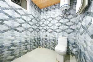 Shower, rainfall showerhead, towels, toilet paper