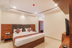 Chambre Prestige | Draps en coton égyptien, literie de qualité, coffre-fort