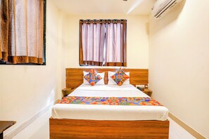 Deluxe Room | Egyptian cotton sheets, premium bedding, free WiFi, bed sheets - Fabexpress Harshita Inn (Navi Mumbai)