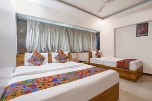 Deluxe kamer | Lakens van Egyptisch katoen, luxe beddengoed, een kluis op de kamer