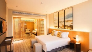 A hotel room with a large bed, a bedside table, a nightstand, a wall-mounted TV, and a large window. - SSAW Boutique Hotel Hangzhou Xixi NanLu - Close to Xixi Wetland Area (Hangzhou)