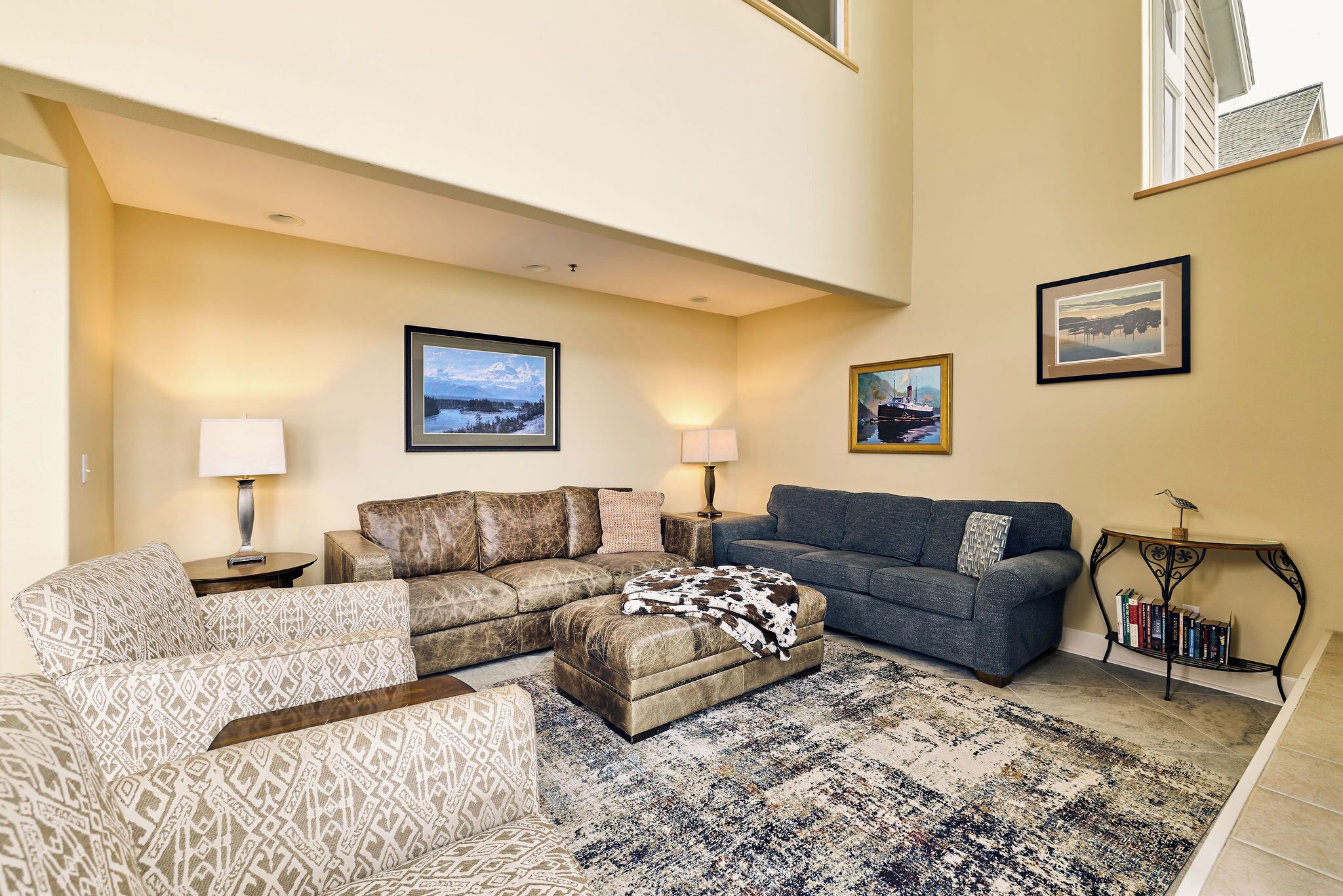 Luxury Condo, Ocean View | Living area | 55-inch Smart TV with digital channels, books
