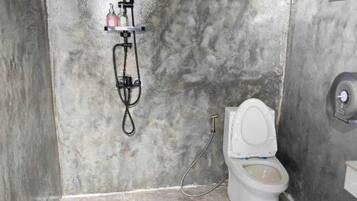 Family Room, Non Smoking, Hill View | Bathroom | Shower, hair dryer, towels, soap