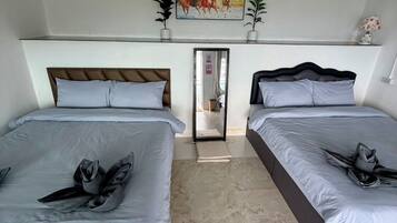 Family Room, Non Smoking, Hill View | Free WiFi, bed sheets