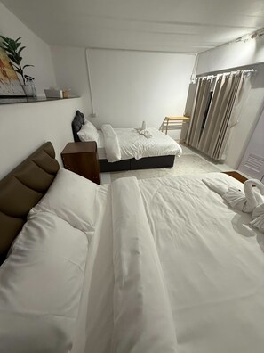 Family Room, Non Smoking, Hill View | 2 bedrooms, bed sheets