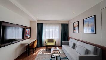 Suite, 1 Double Bed | Minibar, blackout drapes, soundproofing, iron/ironing board