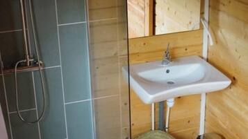Eco-friendly toiletries, hair dryer, towels, toilet paper