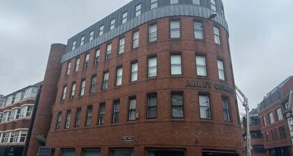 Abbey Corner by Nivaas : One-Bedroom Apartment - Non-Smoking