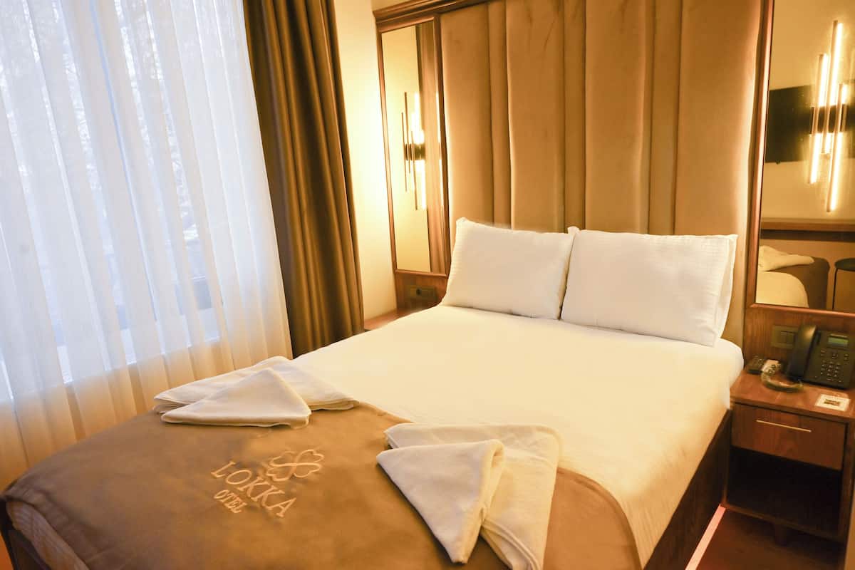 Chambre Double Deluxe, vue partielle sur la mer