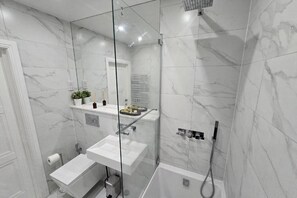 Hair dryer, bidet, towels, soap
