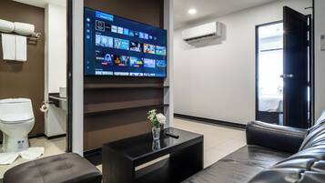 2 Bedroom Family Suite | Living room | Flat-screen TV