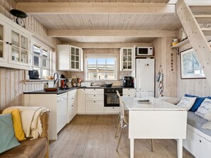 Fridge, microwave, dishwasher, cookware/dishes/utensils