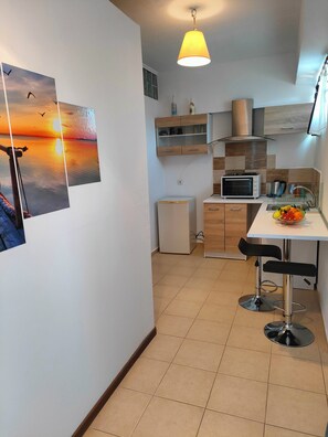 Departamento junior, vista al jardín | 1 habitación, insonorización y wifi gratis 