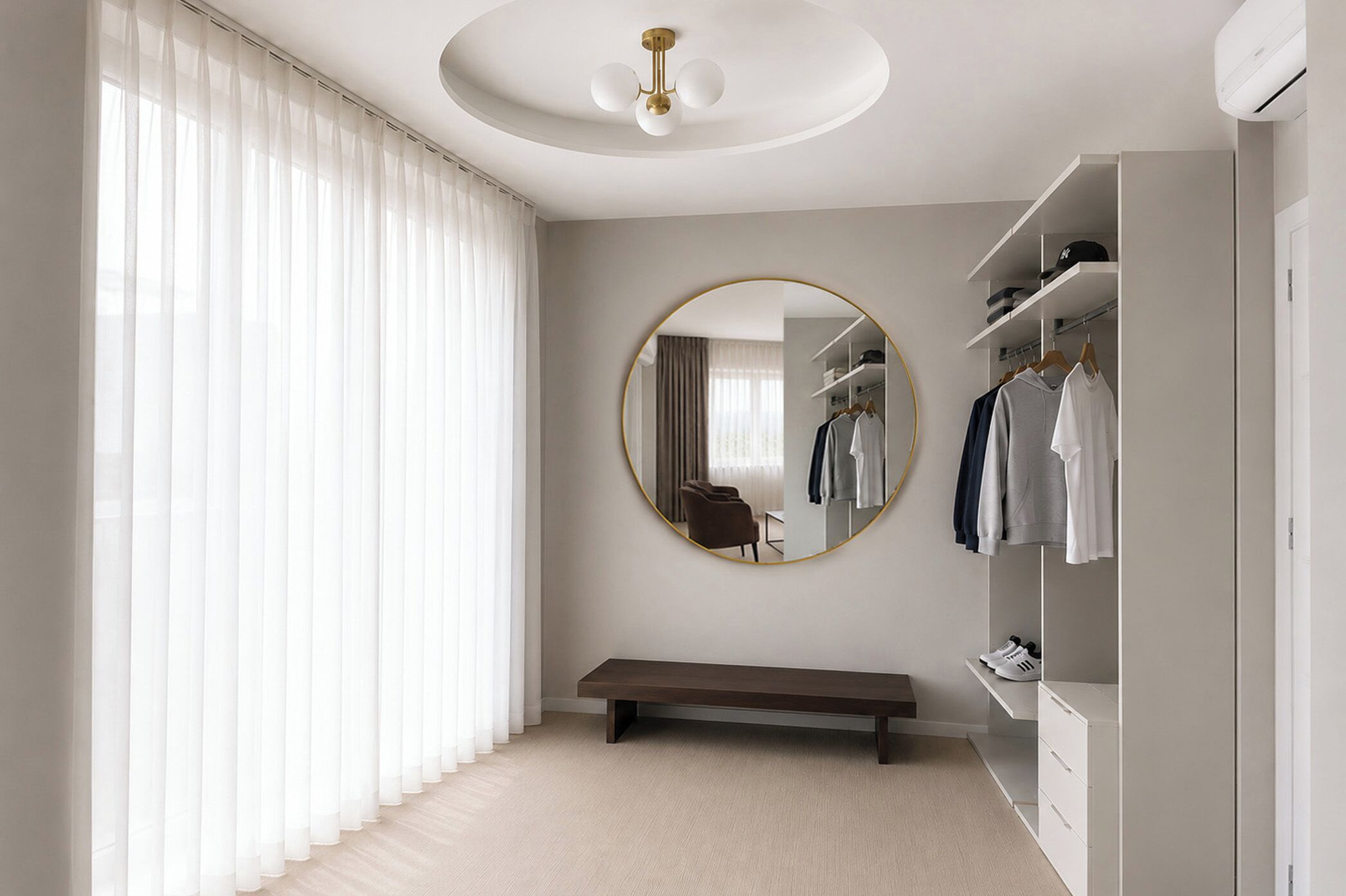 A modern bedroom with a large mirror, a bench, and a wardrobe.