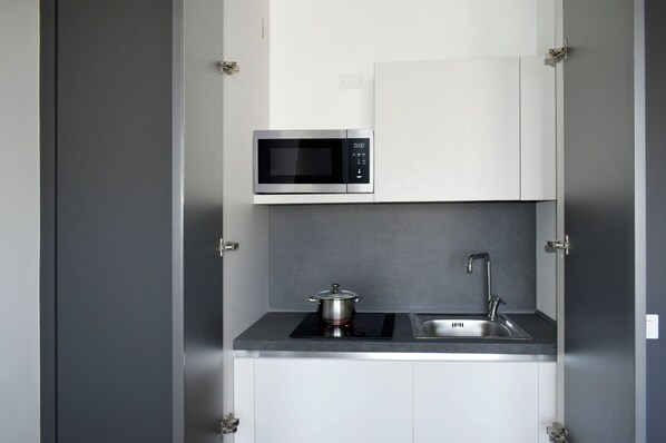 Family Room | Private kitchen - Moon Resort & Spa (Isernia)