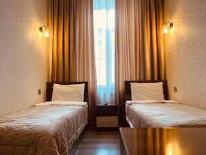 Quarto duplo standard | Berços grátis, Wi-Fi de cortesia, roupa de cama