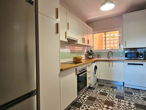 Fridge, microwave, oven, dishwasher