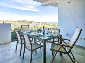 Outdoor dining - Three bedroom apartment in La Cala de Mijas (La Cala de Mijas)