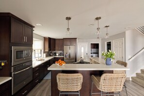 Fridge, microwave, oven, stovetop - A stylish coastal pet and boat friendly oasis on the water with views of the Delta. (Discovery Bay)