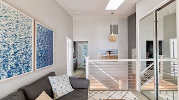 Smart TV, fireplace, books, offices