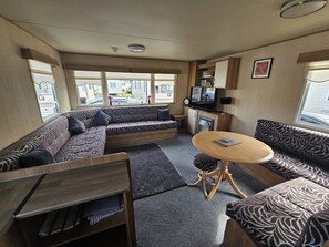 Chalet | Living area | TV, fireplace