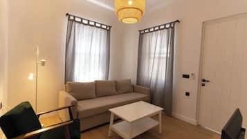 Family Apartment, Patio | Living area | Printers