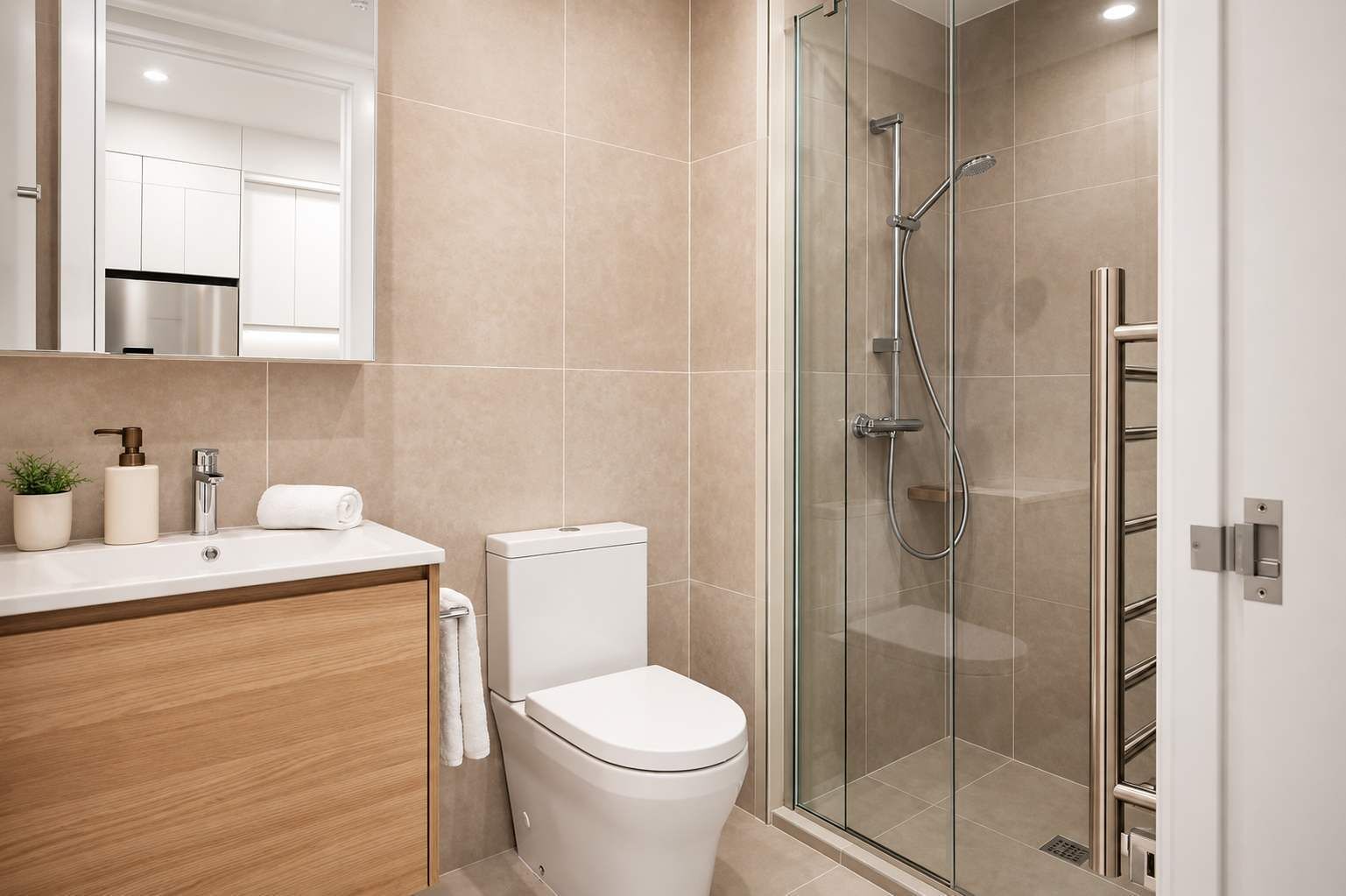 A modern bathroom with a glass-enclosed shower, a toilet, and a vanity with a sink and a mirror.