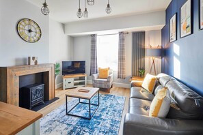 TV, fireplace, books, offices