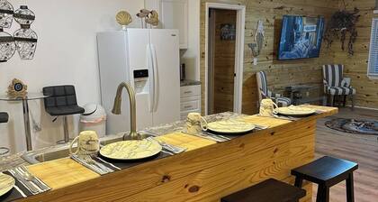 Unique 2-bedroom upstairs unit, just 13 miles to Outer Banks. Close to shopping!