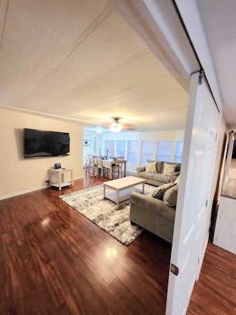 Living area. Country Home in the City with and Acre of Land