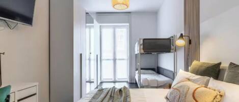 3 bedrooms, desk, iron/ironing board, travel crib