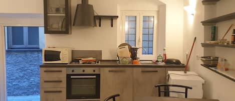 Fridge, stovetop, cookware/dishes/utensils