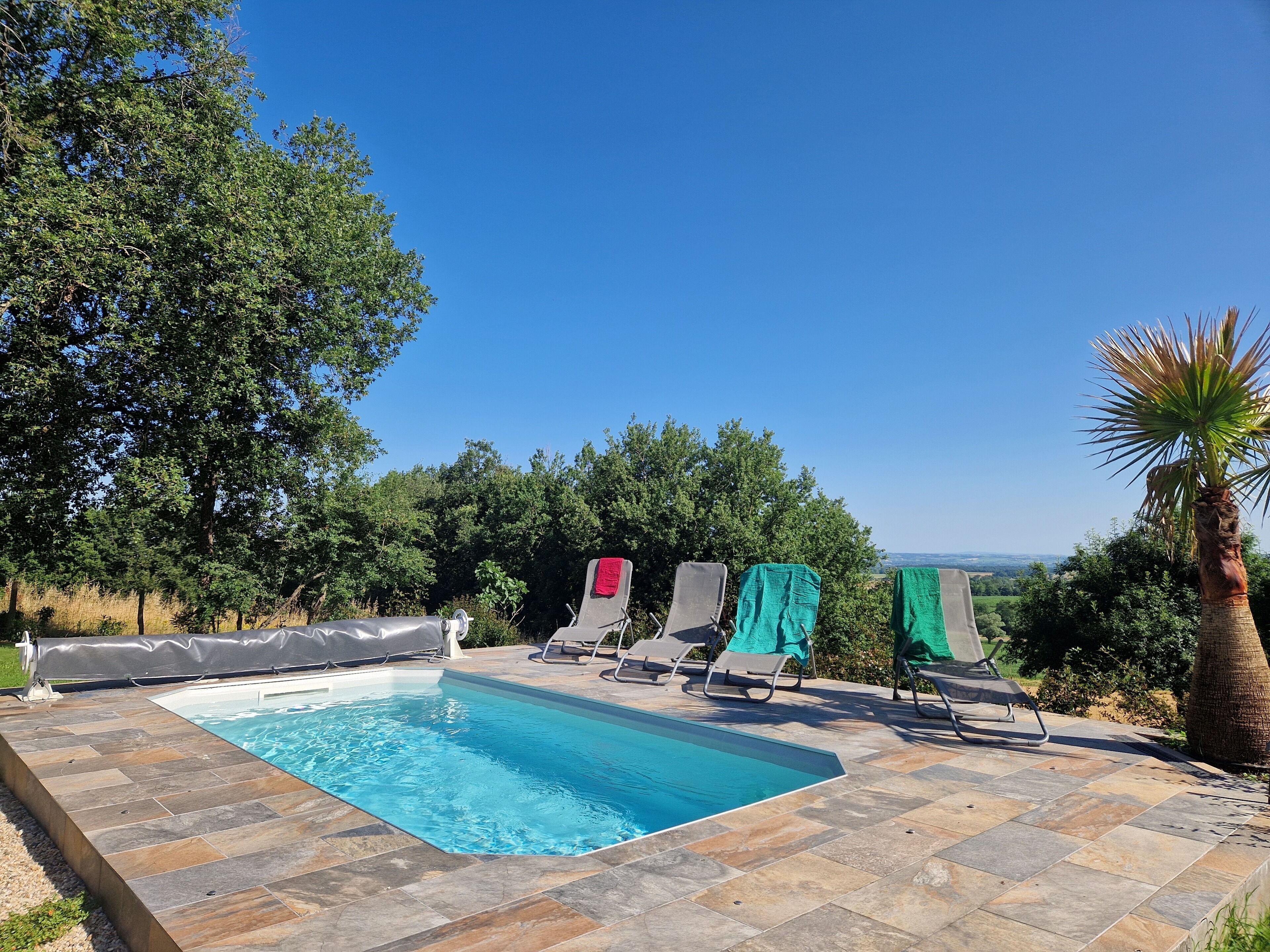 Alberca al aire libre y alberca climatizada