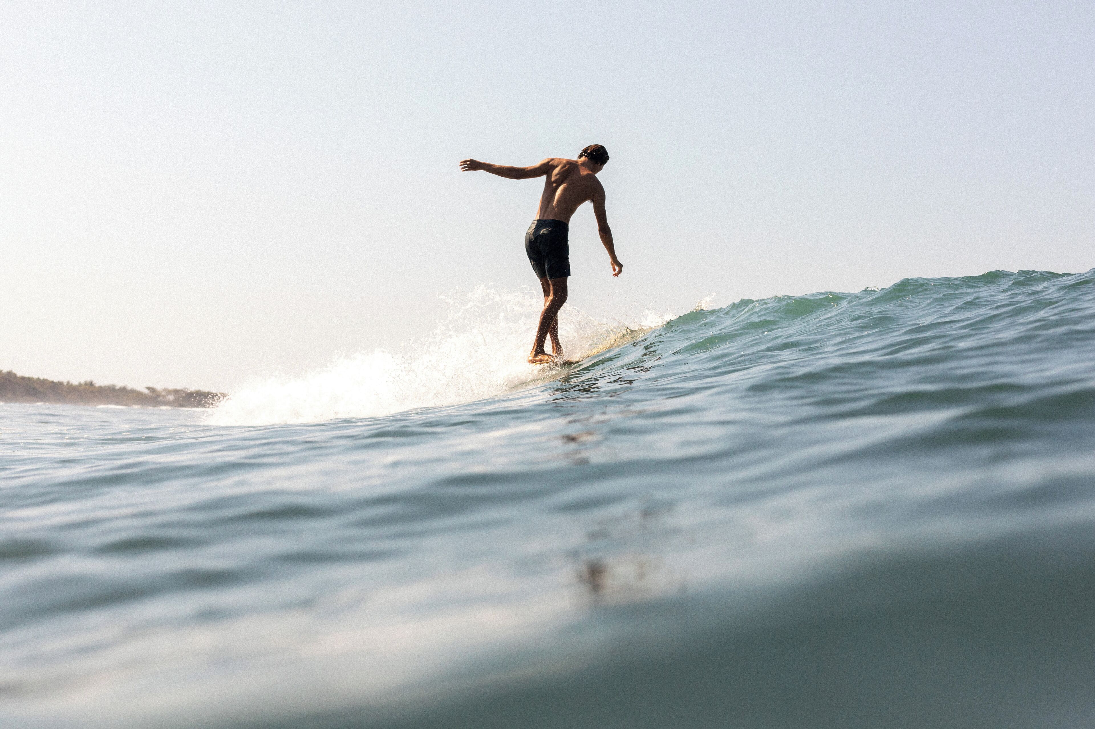 A person surfing on a wave.