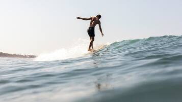 A person surfing on a wave.