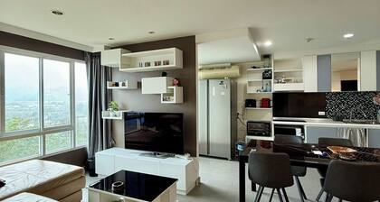 Tranquil 2-bedroom condo with AC and WiFi for a relaxing stay